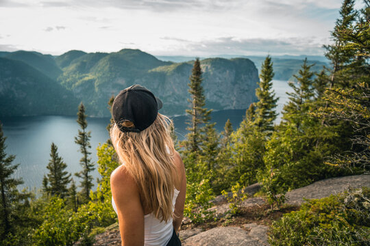 Woman admiring scenic landscape, Quebec, Canada