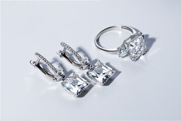 Elegant jewelry set. Jewellery set with gemstones. Jewelry accessories collage. Product still life...