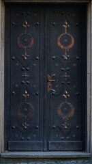 door. old wooden Front Door of a Traditional European Town House. Big Double Arch Door
