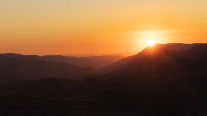 Fotobehang Chocoladebruin sunset in the mountains  © MekunaPhotography