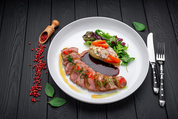 Plate with duck breast and pear, duck L'Orange