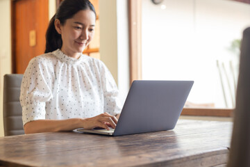 woman work using computer hand typing laptop keyboard contact us.student study learning education online.adult professional people chatting search at office.concept for technology device business