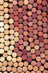 Collection of wine cork from white and red wine, natural texture bottle stoppers top view, colorful background from closeup wooden corks. Natural textured stoppers Winery, winemaking concept