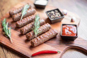 Grilled kebab with spices on a rustic background