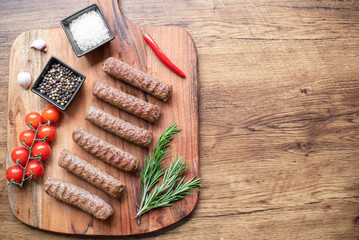 Grilled kebab with spices on a rustic background with copy space for your text