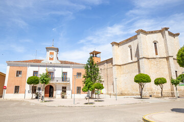the city hall (casa consistorial) and the church at the main square of Valdestillas, province of Valladolid, Castile and Leon, Spain