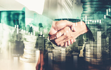 Business handshake on finance prosperity and money technology asset background . Economy and...