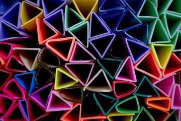 Background of colorful abstract texture with plastic triangles