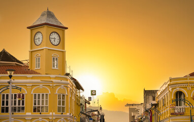 Phuket old town. Famous old clock tower at sunset time. Sino-Portuguese Architecture. Top travel destinations in Thailand - obrazy, fototapety, plakaty