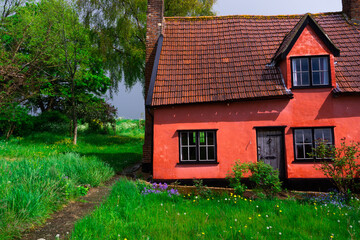Pink English cottage with pretty garden