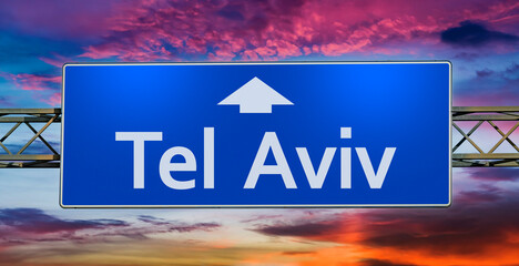Road sign indicating direction to the city of Tel Aviv