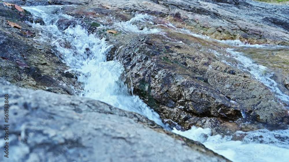 Poster The flow of clear water within the area of ​​Huay Keaw waterfall, Chiang Mai province.