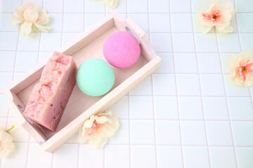 Bath bombs and soap in bathroom, wellness treatment