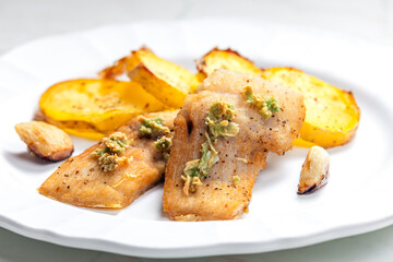 salmon fillet with garlic pesto and fried potatoes