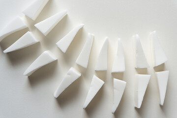 applicators or sponges also known as wedges arranged on blank paper