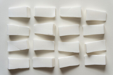 applicators or sponges also known as wedges arranged on blank paper