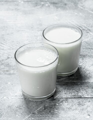 Milk in glasses.