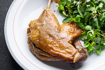 duck leg confit second course healthy meal food snack on the table copy space food background rustic top view