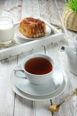 serving tea in white cups