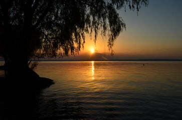 Naklejka na ściany i meble sunset on the lake
