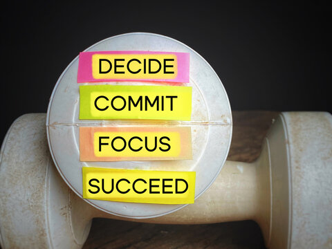 Inspirational And Motivational Concept - DECIDE COMMIT FOCUS SUCCEED Text On Stickynotes Background. Stock Photo.