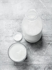 The milk in the bottle.