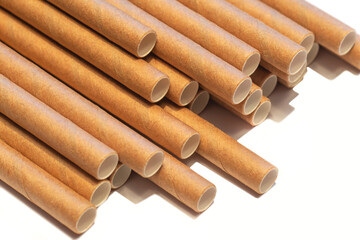 Brown paper straws isolated on a white background