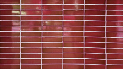close up red mosaic wall tiles in modern style. real antique ceramic interior wall tiles. wall...