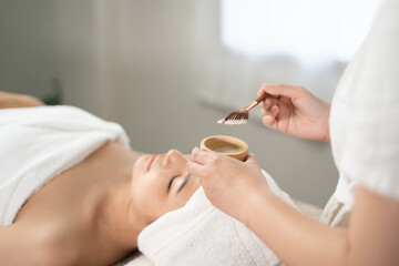 Young Asian beauty woman enjoying massage and spa.