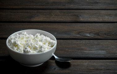 Cottage cheese in bowl .
