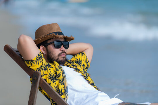 Asian Man Sitting Chair Beach Inside Sea,Relax Time At Summer