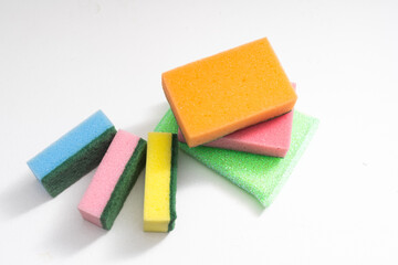 Kitchen dishcloth, cleanup concept, housework. Colorful kitchen sponges for cleaning close-up, housekeeping.