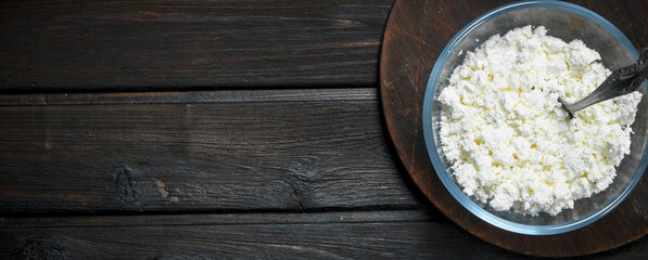 Cottage cheese in bowl .