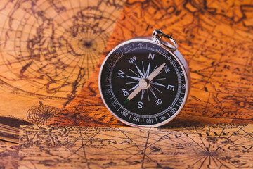 Looking for adventure. Compass and maps. Treasure map and path to the treasure.