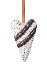 Brown handmade fabric heart. Stitched decorative pillow in the shape of a heart. White dotted heart with brown decorative ribbons isolated on transparent. PNG. Valentine's day concept. Symbol of love.