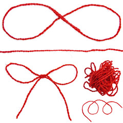 Red thread isolate on white background. Selective focus.