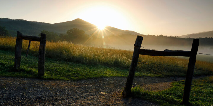 Foggy sunrise at Cades Cove in Smokey Mountain National Park.