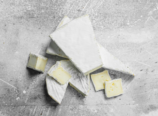 Pieces of brie cheese.