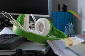 Chaos in Creativity: A Teen's Cluttered Desk of Everyday Essentials.