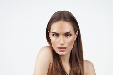 Fototapeta premium Beautiful caucasian girl with perfect skin and natural makeup on white background