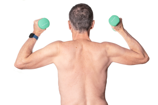 Senior man with naked back exercising with arm or hand weights and isolated against white background