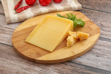 Parmesan hard cheese with small pieces