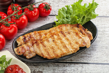 Grilled pork steak with ketchup
