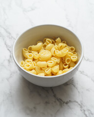 macaroni on bowl with white background