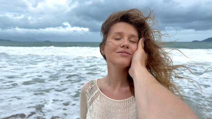 Beautiful girl, young happy positive woman is leading man, holding hand, follow to her to summer...