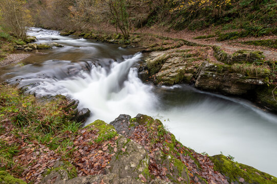 Long exposure of the Watersmeet Bridge waterfall at Watersmeet in Exmoor National Park