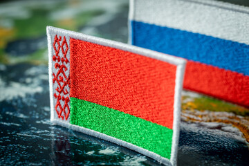The flag of Belarus and the flag of Russia in the background, concept, Mutual relations of the two...