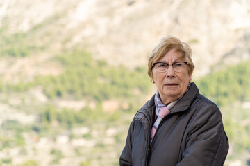 Portrait, caucasian senior woman looking worried.