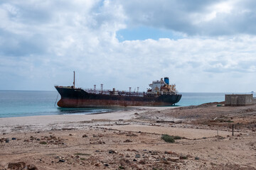 Oil tanker shipwreck on a beach