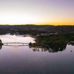 Square picture of nautic area lack of saint pardoux, limousin, france, during an automnal sunrise